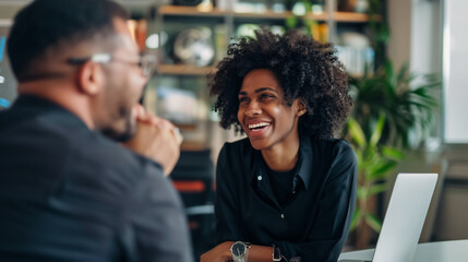 couple talking with each other in happy mode  in a cafe