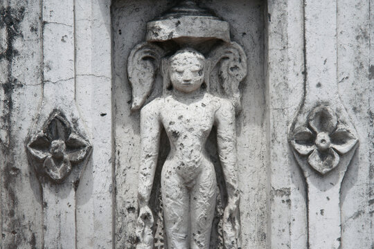 Vadodara, Gujarat / India - April 08, 2014: The view of the stone carved statues at the Shri Parshwanath Digambar Jain temple.