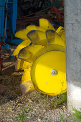 Agriculture industrial equipment at shelter at village of Zabnica on a blue cloudy summer evening. Photo taken August 10th, 2023, Zabnica, Kranj, Slovenia.