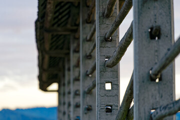 Idyllic close-up view of hayrack at farmland at village of Zabnica on a blue cloudy summer evening. Photo taken August 10th, 2023, Zabnica, Kranj, Slovenia.