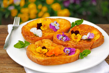 Torrijas with honey and pollen. Fried bread, typical meal from Spain.