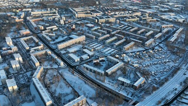 Drone flying above Cottbus while it is covered by snow in winter in Germany