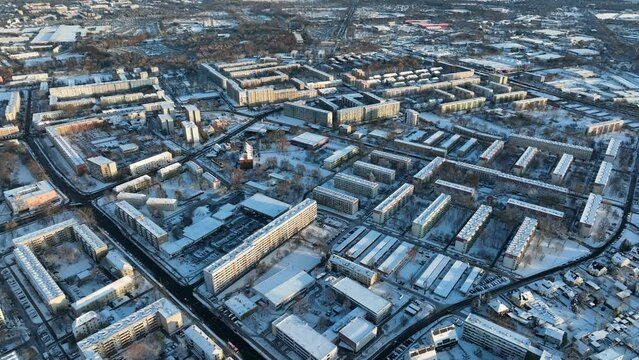 Drone flying above Cottbus while it is covered by snow in winter in Germany