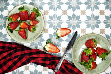 fresh strawberries on Arabic tiles backdrop