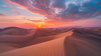 Fototapeta na wymiar Sunrise over sand dunes
