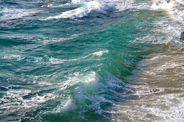 Mediterranean Sea. Sea wave. An abstract background of seawater flow under light exposure