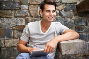 Tablet, thinking and happy man at restaurant outdoor with web, menu or checking food, order or...