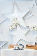 Elegant Tea Set with Star Decor and White Flowers