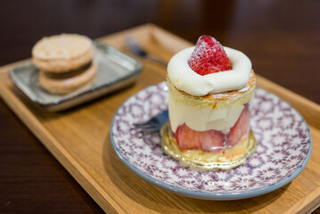 Strawberry cake with coffee in restaurant