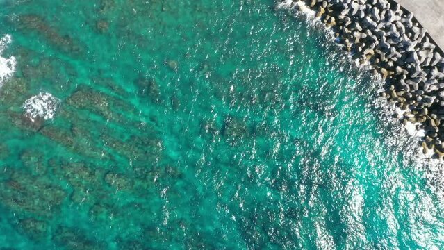 Top aerial drone view of waves. Blue ocean, Emerald blue. 4K.