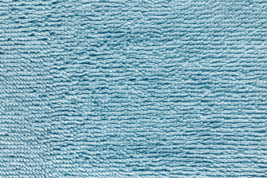 abstract background of blue terry towel texture close up