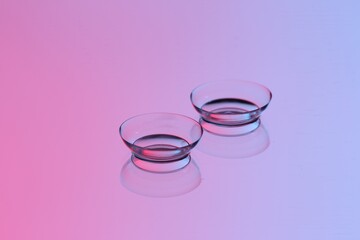 Pair of contact lenses on mirror surface