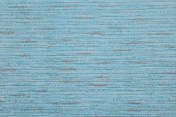 Stylish light blue wallpaper as background, closeup view