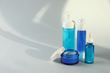 Set of luxury cosmetic products on white background. Space for text