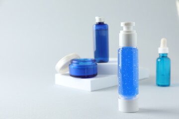 Set of luxury cosmetic products on white background. Space for text