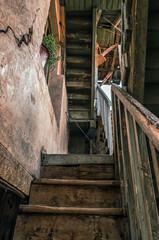 Fototapeta na wymiar wooden stairs of an old house