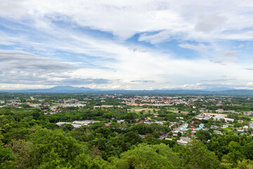 Beautiful Nan valley with town, mountains and sky in Nan province, North Thailand. View from Wat Khao Noi.