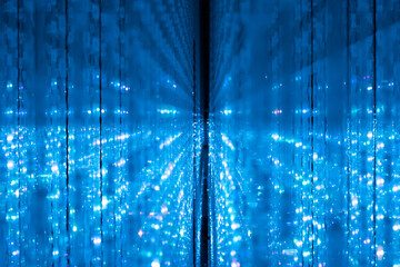 A mesmerizing view inside a futuristic tunnel illuminated art by blue LED lights creating a sense...