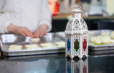 Ramadan celebration in kitchen while preparing pakeries for family on iftar