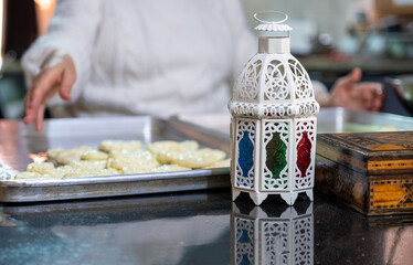 Ramadan celebration in kitchen while preparing pakeries for family on iftar
