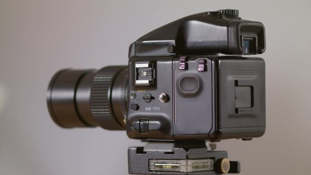 Professional photo studio and film analog camera. Roll Film Camera.
Mamiya 645 Pro TL Medium Format film camera. 
Holder Back Magazine Cassette . Roll film back adapter dark slide shading sheet. 