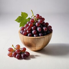 grapes in a bowl on white
