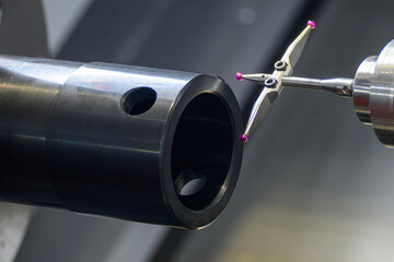 The modular touch probe checking the tube parts on CNC lathe machine.
