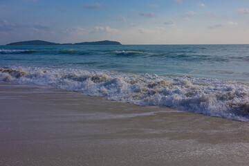 Fototapeta na wymiar Sea beach wave blue sky with cloud white sand beach summer vacation concept