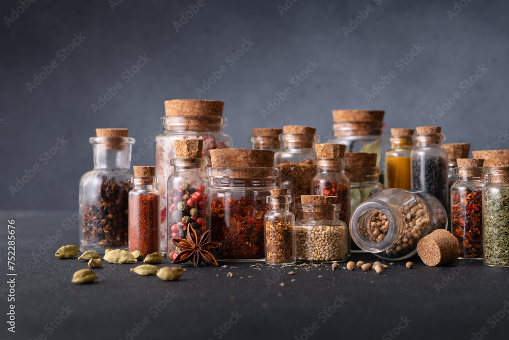 Wall mural seasoning (herbs and spices) in small bottles