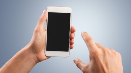 Hand holding modern smartphone with a blank screen