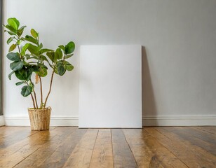 blank art canvas mockup on the laminate floor against a plain white wall