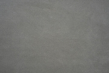 Grey, textured background of concrete wall for graphic design and web design. High quality photo. Closeup, copy space.