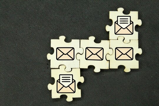 wooden with read and unread email icons. depicts alert for unread un-opened message. Envelope concept