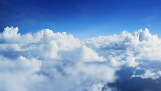 An endless flight through the clouds. Daytime. Realistic 3d animation. Loop.