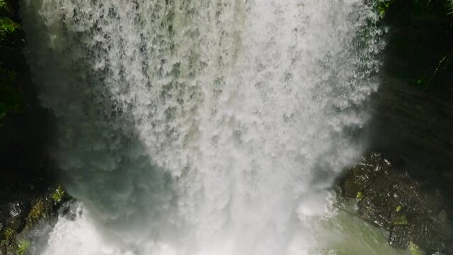 Scenic view of waterfalls in slow motion. Hikong Alo Falls. Lake Sebu. Mindanao, Philippines.