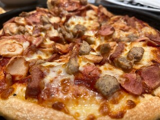 Pizza with beef sausage
