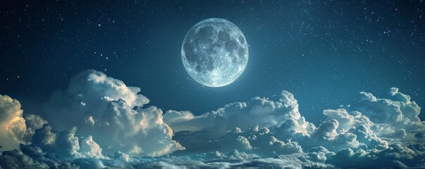 View of the moon in the night sky with clouds.