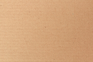 Cardboard sheet texture background, detail of recycle brown paper box pattern.