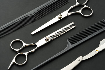 Tools for barbershop on black background studio shot