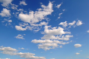 Blue sky and cumulus clouds.