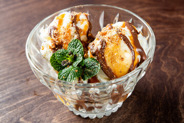 Vanilla and chocolate sauce,sorbet, syrup, sherbet sundae dish ice cream in cup