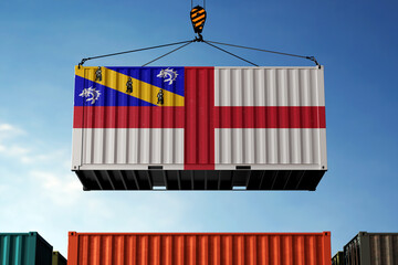 Herm trade cargo container hanging against clouds background