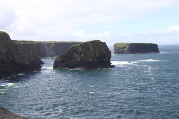 Fototapeta na wymiar Bishop's Island and the Kilkee Cliffs along the Kilkee Cliff Walk, County Clare, Ireland