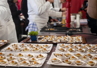Degustation appetisers for visitors made by great chefs of high cuisine French restaurants, winter festival, Avenue de Champagne, Epernay, France