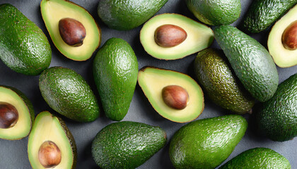 Fresh green avocado background. Natural and tasty product. Healthy eating.