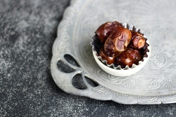Dates or Dried Dates on silver tray