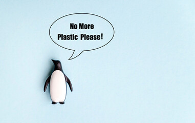 Penguin with speech bubble message . No more plastic please 