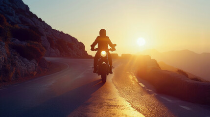 The powerful silhouette of a professional motorbike rider cruising at high speed, captured from a...