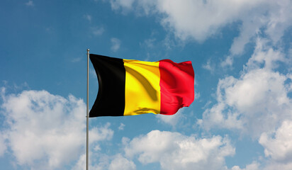 Flag Belgium against cloudy sky. Country, nation, union, banner, government, Belgian culture, politics. 3D illustration