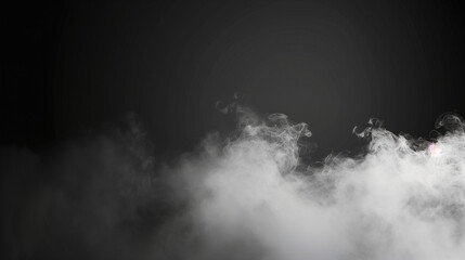 White and grey smoke slowly floating in the air on dark background